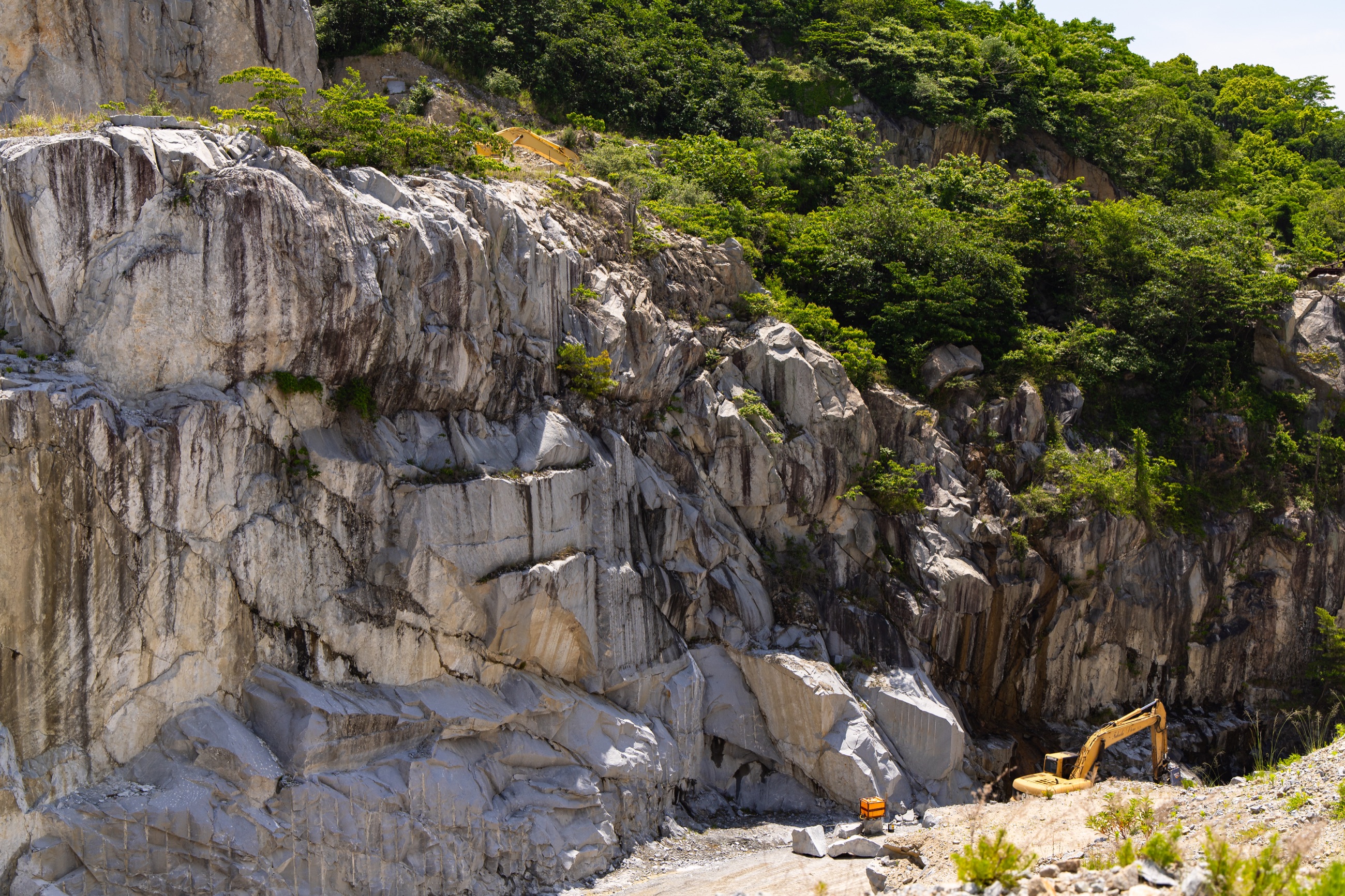 Aji stone quarry with its rock face and machinery