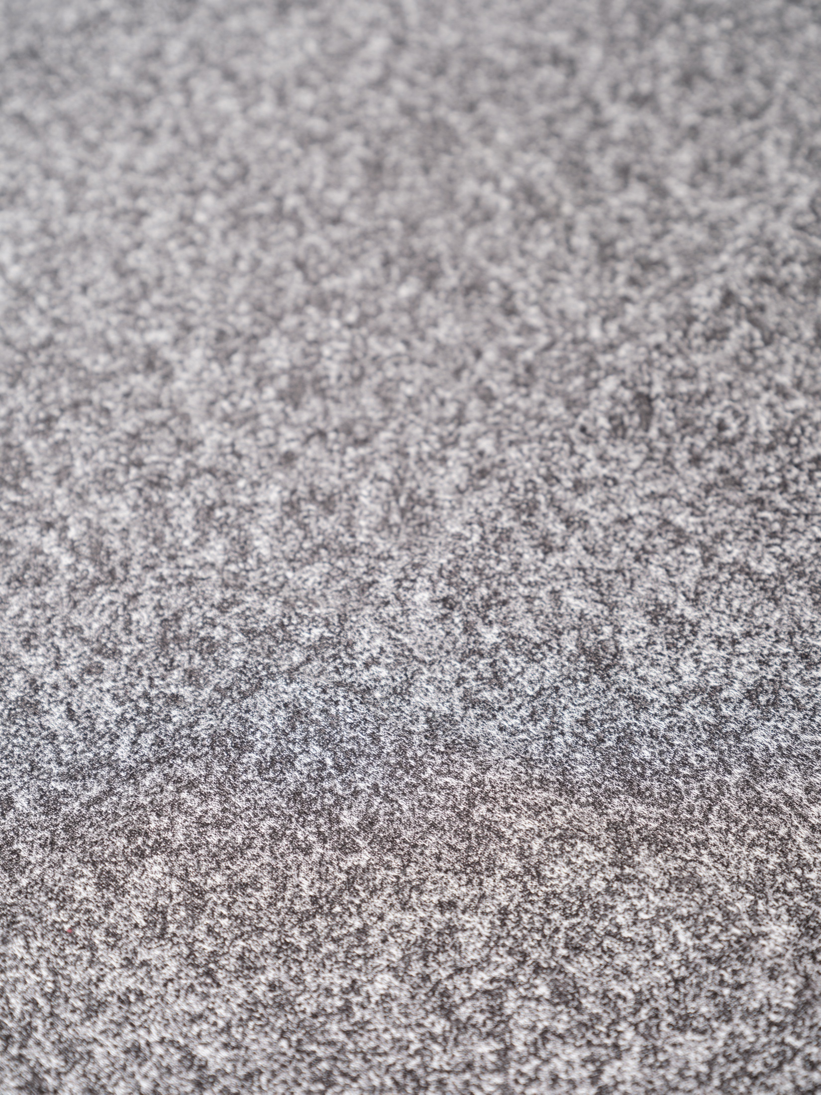 A close view of the pale WARI fabric