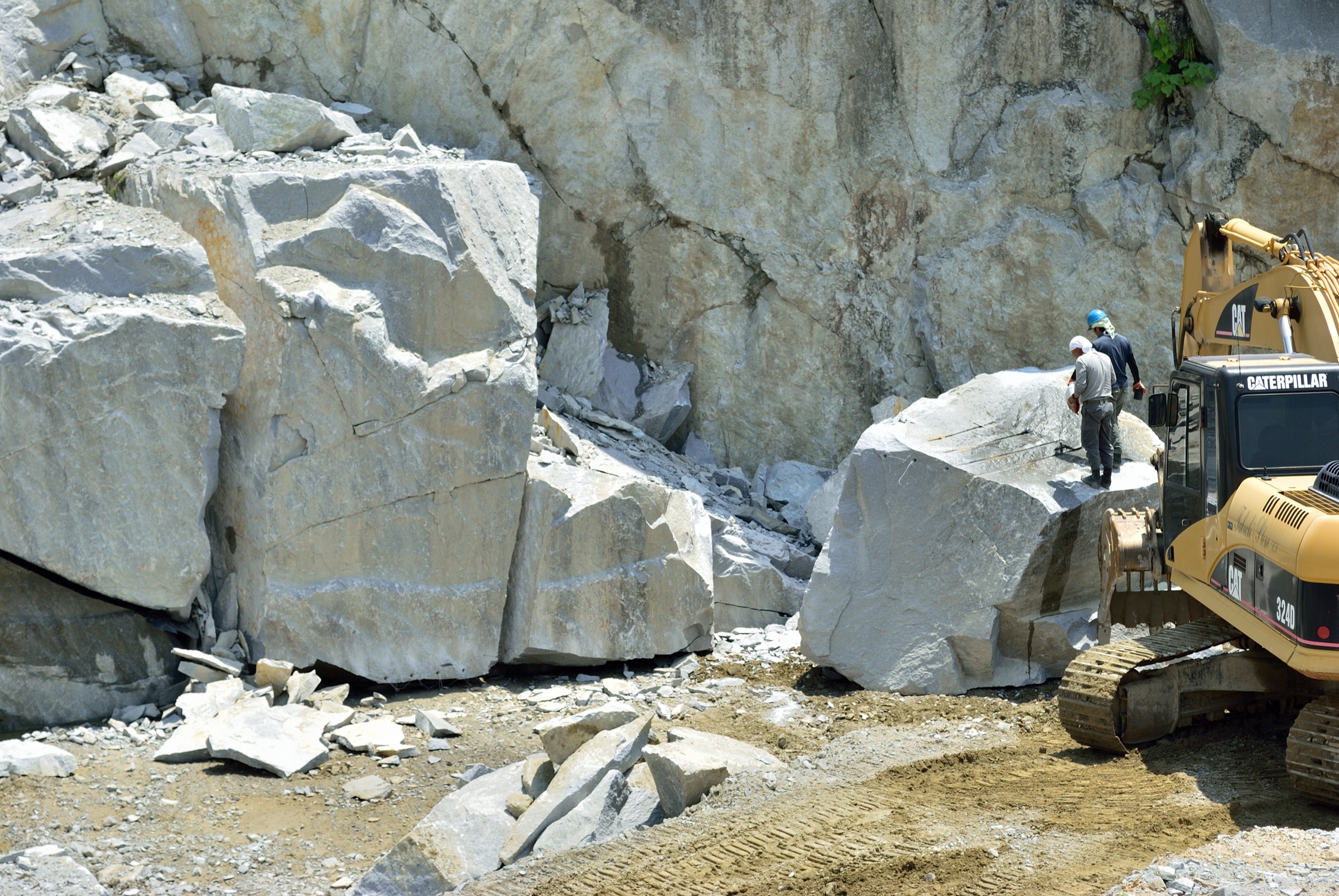 Raw stone at the quarry, the starting point for material selection.