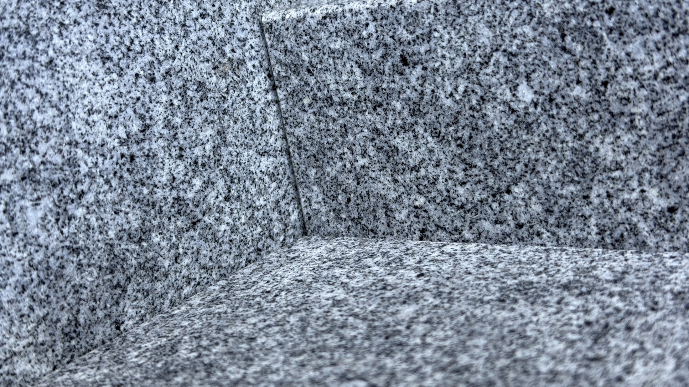 Polished Aji stone: mineral grains and adjoining surfaces.