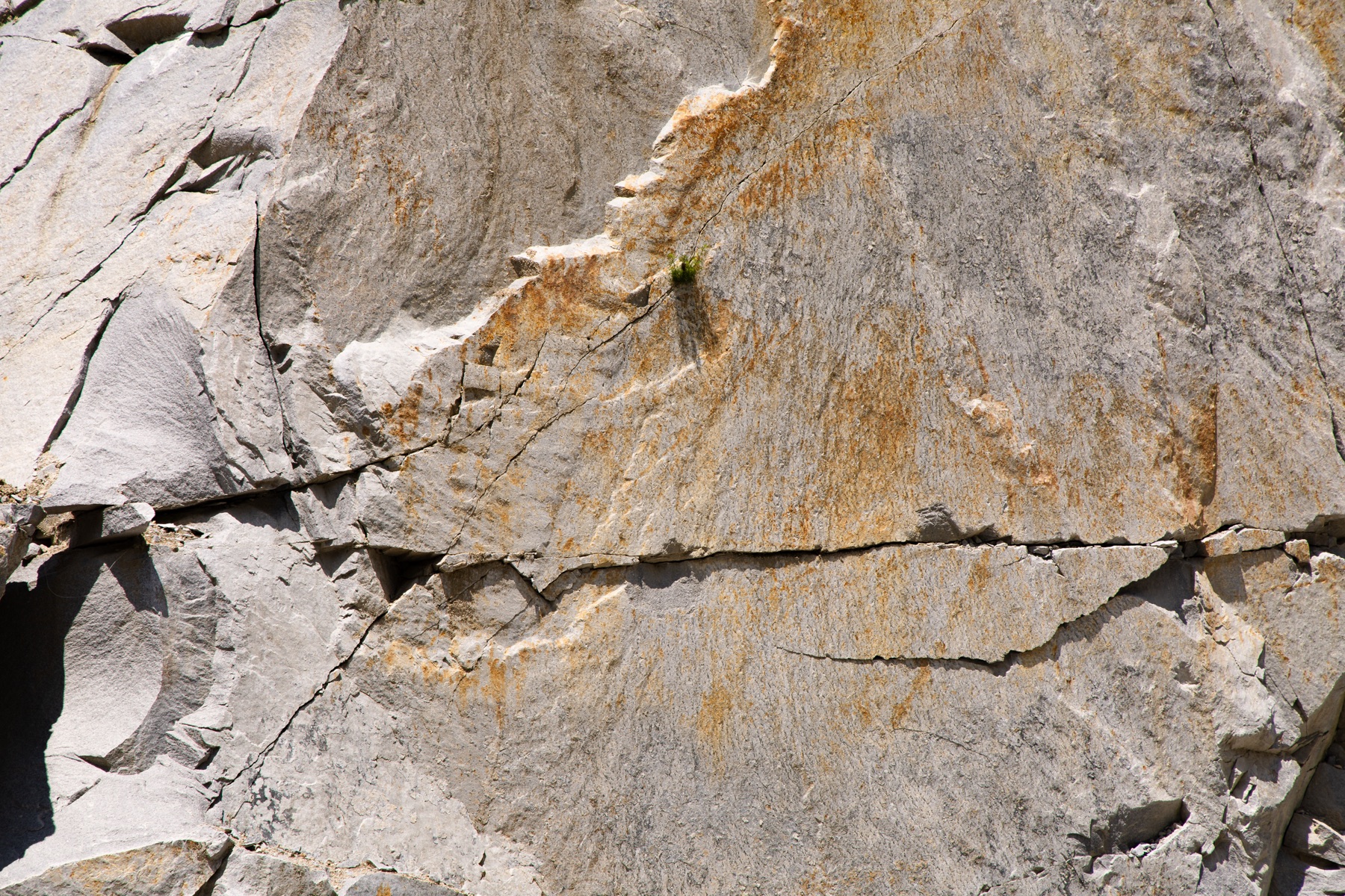 Natural brown colour variations across a rock face.